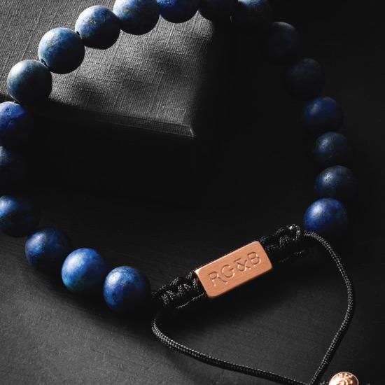 Lapis Lazuli Bracelet - Our Lapis Lazuli Bead Bracelet Features Natural Stones, Waxed Cord and Brushed Rose Gold Steel Hardware. A Beautiful Addition to any Collection.